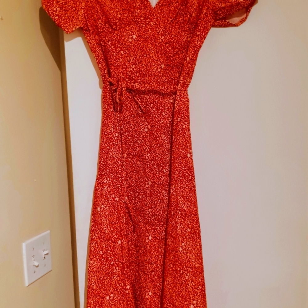 Cute little v neck red floral dress. Size M, and L.